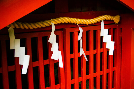 Traditional Japanese shrine decoration with shide paper streamers