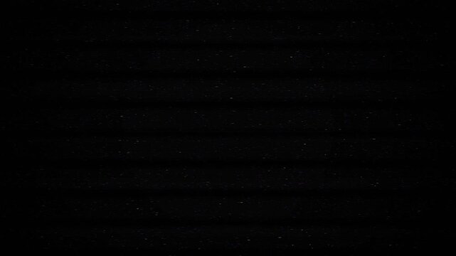 Digital glitch horizontal scanlines flickering and expanding with blue light glow on black background for video transition overlay