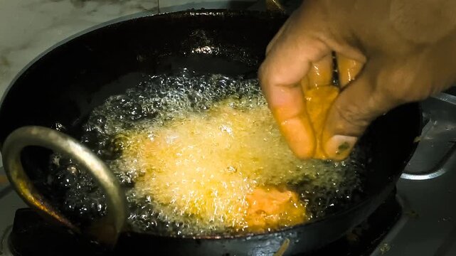 Zoom shot of mixing spicy red chicken kabab marinade marinade