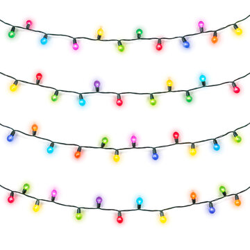 Multicolored string lights hanging in diagonal rows on white background