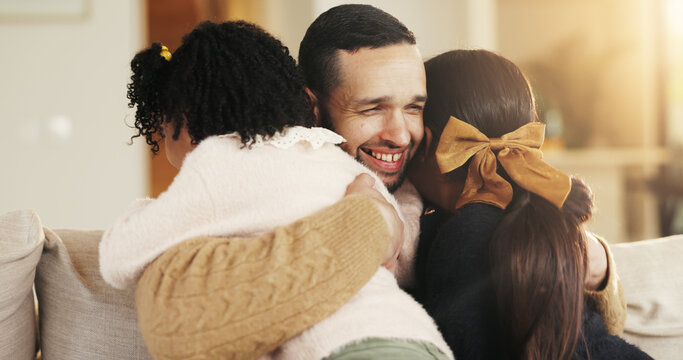 Dad, children and smile on sofa with hug, bonding together or support for family connection on weekend. Happy, man and young girl kids in home with embrace, parent care and love for fathers day.