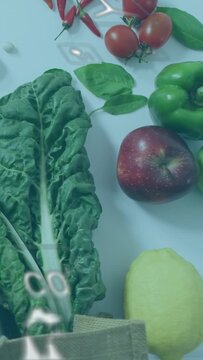 Vertical video: Playback starting, leafy green anchoring left, icons drifting and showing CO2