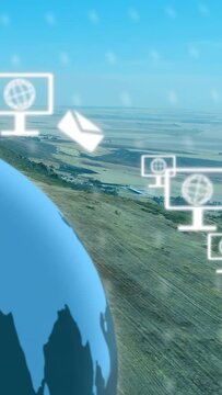 Vertical video: Globe appearing, spawning drifting monitors and visualizing network over coast
