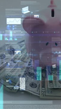 Vertical video: On HUD launch, AR graphs sweeping over pink piggy bank on USD notes, showing trends