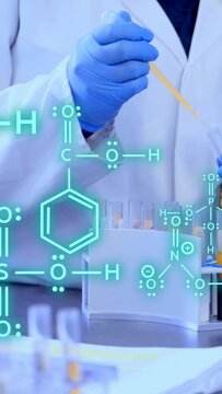 Vertical video: View pulling back revealing teal molecules and lab tech pipetting tubes for testing