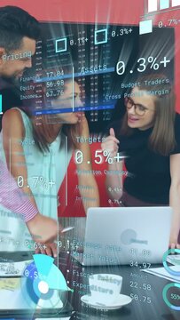 Vertical video: Finance team leaning around laptop, docs, man joining and adding AR data for review