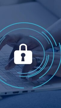 Vertical video: Man typing on laptop keyboard, lock icon and blue rings appearing, encrypting data