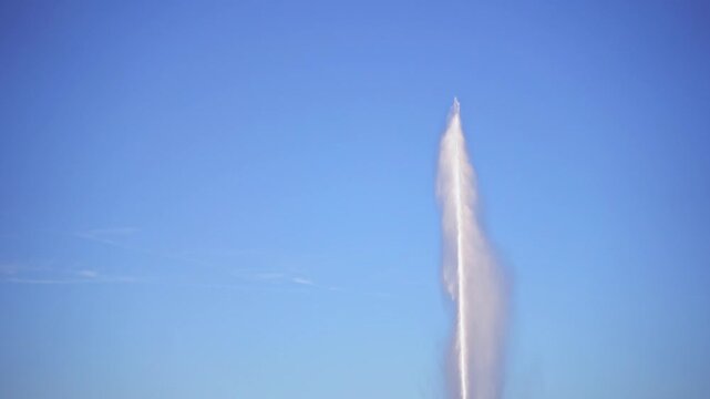 The Jet d&rsquo;Eau fountain rises above Lake Geneva in Geneva, Switzerland. The landmark waterfront and panoramic city views attract tourists to one of Switzerland&rsquo;s most popular travel destinations during