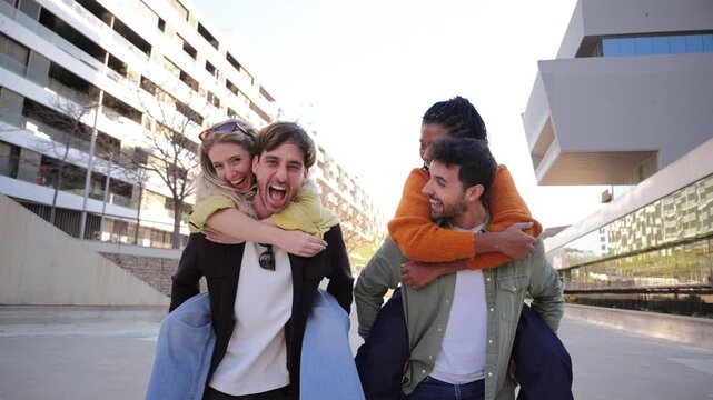 A group of four cheerful friends engage in playful antics, creating memorable moments filled with laughter and joy as they share a wonderful day together in a friendly and fun atmosphere.