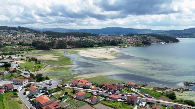 Aerial view flying over campelo village in pontevedra galicia spain