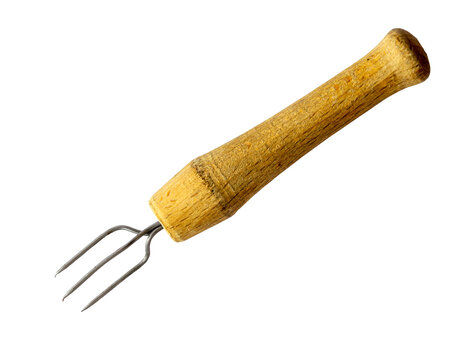 Kitchen trident with three metal prongs and turned wooden handle, photographed isolated on white background, utensil used for holding hot potatoes or vegetables securely while peeling or cutting