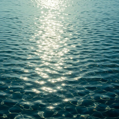 Obraz premium Sparkling sunlight reflecting on rippling ocean water surface