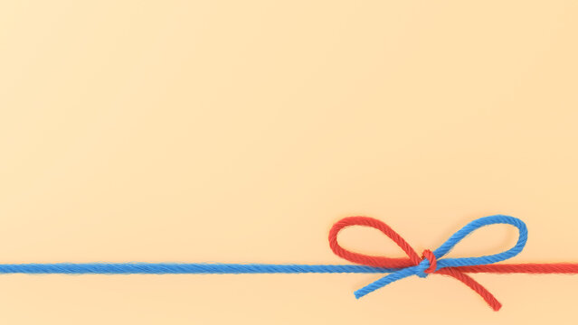 Blue and red woolen bow, 3d rendering
