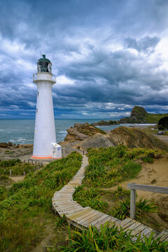 Castlepoint lighthouse guiding ships along new zealand coast