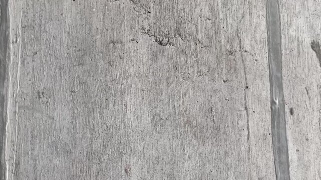 Grunge Grey Concrete Wall Texture with Cracks and Weathered Detail