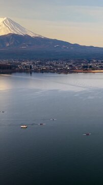 Mt Fuji and lake Kawaguchi aerial view with rowing team practice at sunset.