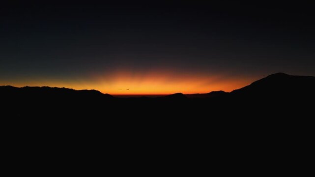Vivid first light of sunrise over Bromo Tengger Caldera in East Java, abstract