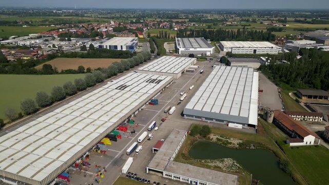 Warehouse and transport operations center in Italy. Modern logistics infrastructure supporting commercial distribution networks.