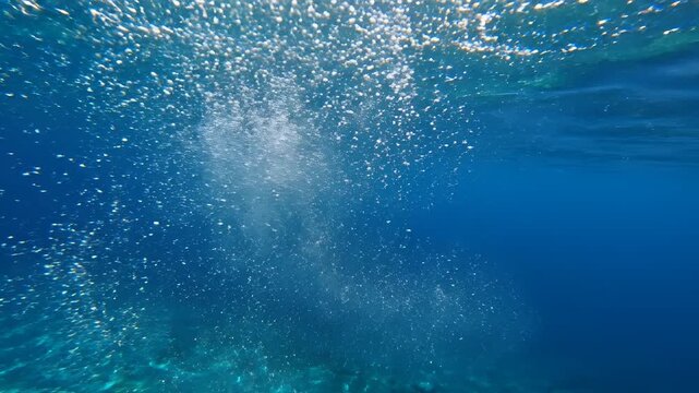 Underwater Bubbles Rising From The Ocean Floor.