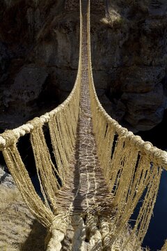Last useable Inca hanging bridge, rope bridge made of braided Peruvian feather grass (Jarava ichu) over Apurimac, Peru