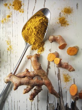 Fresh and powdered turmeric  or tumeric root (Curcuma longa)