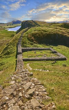 Hadrian's Wall with foundation walls of former watchtower, Haltwhistle, Northumberland, England, United Kingdom