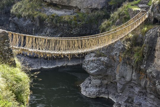 Suspension bridge Q'iswachaka from the Inca era, rope bridge of braided Ichu grass (Jarava ichu) over Rio Apurimac, Canas province, Peru