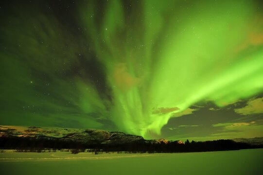 Northern lights, Aurora borealis, over the frozen river Gammelbollo, Sorrisniva, Alta, Norway