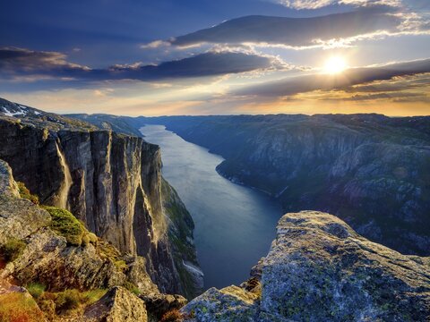 Rock face of Kjerag above the Lysefjord in the evening light, Lyseboten, Rogaland, Norway