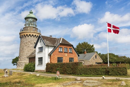 Lighthouse Hammeren Fyr, Danish flag, Allinge, Bornholm, Denmark