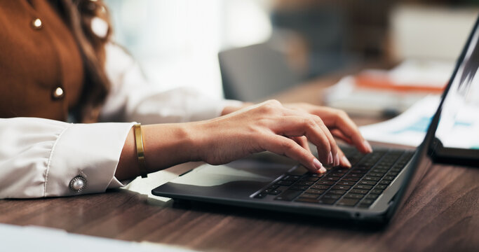 Hands, typing and employee with laptop in business, online or data entry for financial report on web. Office, actuary and person with tech for investment update, risk assessment and budget analysis