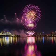Colorful fireworks exploding over city skyline and river at night for celebration holiday or New Year's Eve event.