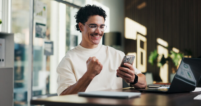 Phone call, happy and man with fist pump in office for business deal, win or achievement. Excited, celebration and software sales representative with good news, client feedback or mobile discussion