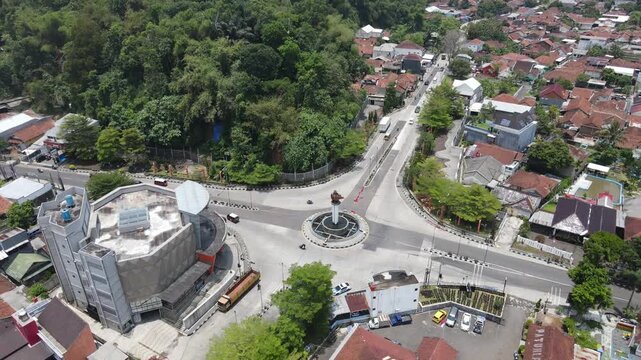 Drone shot of urban road junction and residential neighborhood in Sumedang