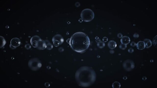 Transparent liquid spheres float in dark space, showcasing fluid motion, weightlessness, purity, clarity, scientific observation, and minimalist abstraction