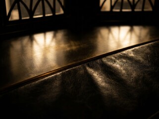 Dark textured floor with soft light rays casting shadows in dim interior space © MajidHusain