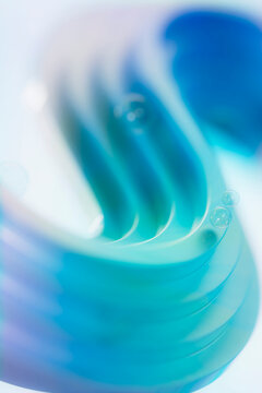 3D aqua glass spiral with bubbles and soft blur form