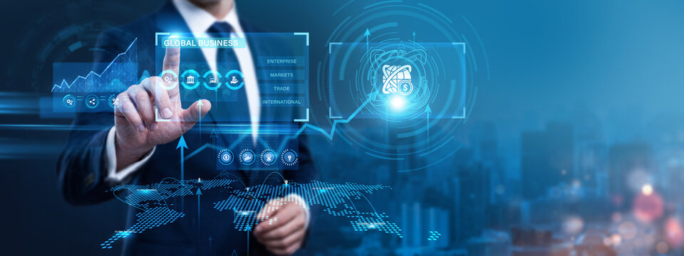 Managing Director Using Digital Screen with Global Business and networking cross border trade commerce data. Expanding international market reach, coordinating offshore subsidiary systems