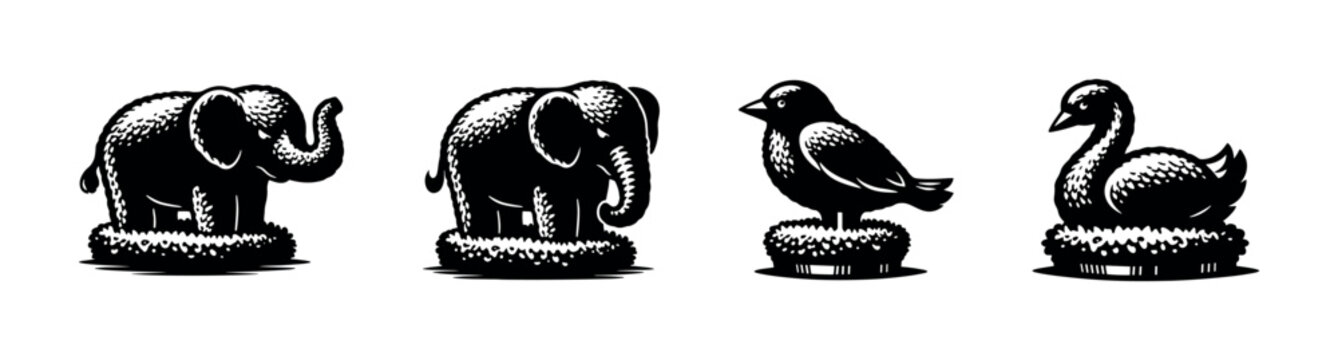 Collection of stylized animal silhouettes including elephants, a bird, and a swan