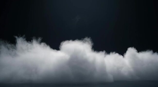 Thick white smoke spreads across a dark background, representing atmosphere, mystery, transitions, ethereal layers, abstract movement, and cinematic effects
