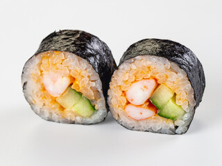 Closeup of two maki sushi rolls with shrimp and cucumber filling isolated on white. © Andrei Starostin