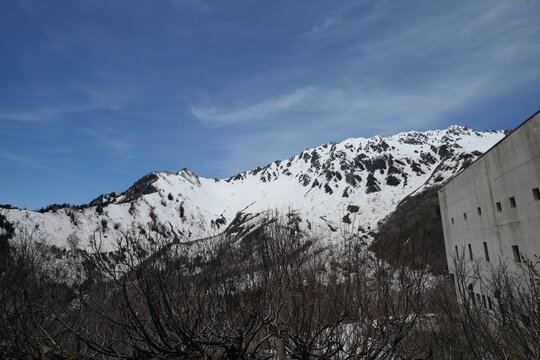Snowy Tateyama mountain range viewed from Kurobedaira in spring.