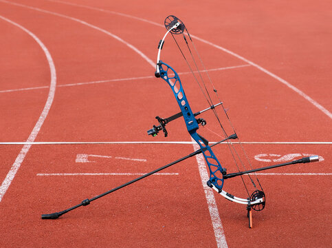 Archery. Professional compound bow. Competition field. Track lines. Archery arena. The composite bow is placed on a stand. Equipment for archery. Sports concept
