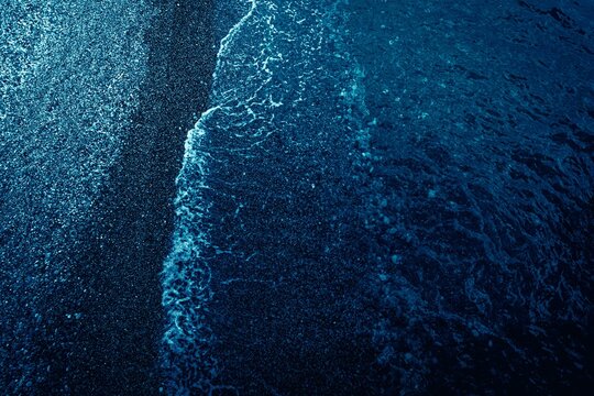 Dark blue pebble coast line