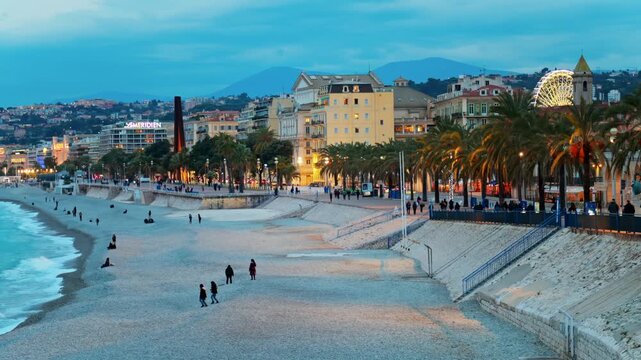 Evening twilight view over Promenade des Anglais at Nice beach in France.