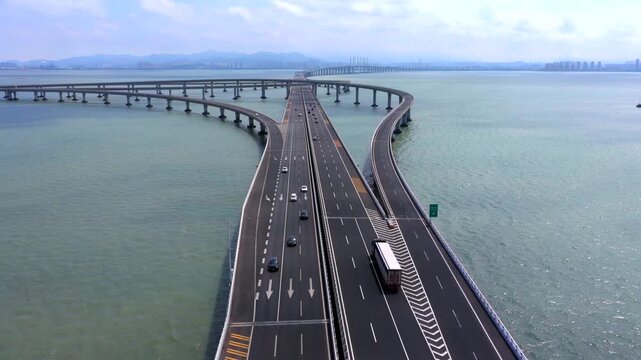 Aerial view of the cross-sea bridge
A magnificent Chinese sea bridge, with cars driving on it