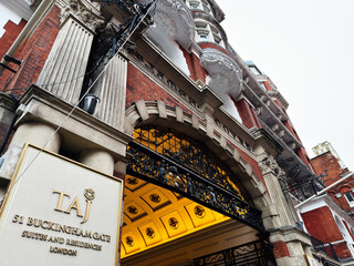 Fototapeta premium Luxury Taj hotel entrance at 51 Buckingham Gate with ornate architecture in London, UK