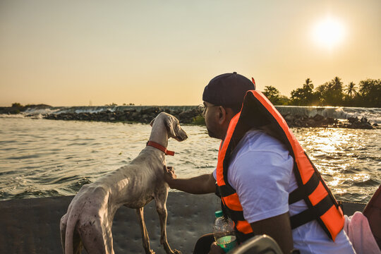 Man and his loyal dog sharing a moment of trust and companionship during an outdoor adventure, symbolizing friendship, loyalty and the bond between humans and animals