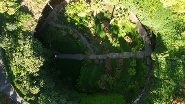 Umpherston Cave, Mount Gambier, South Australia: 4K aerial drone view of sunken garden, limestone cave and heritage sinkhole
