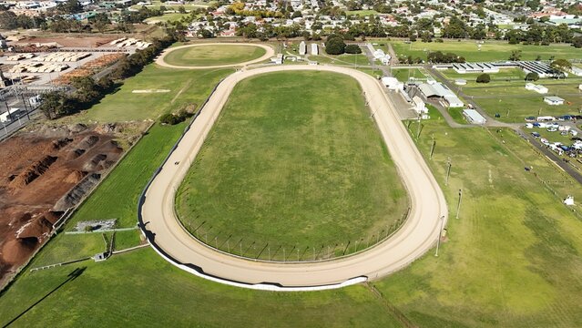 Mount Gambier Showgrounds, South Australia: 4K aerial drone view of event grounds, oval track, open field and surrounding suburb near Umpherston Cave